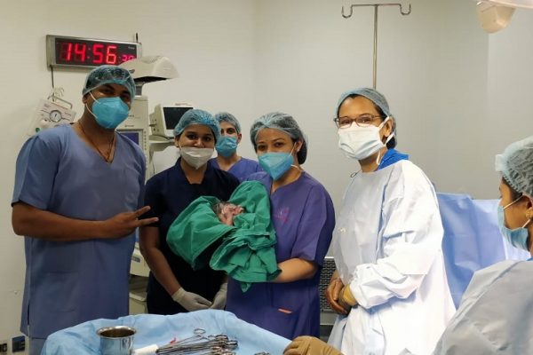 Cloudnine team (From right – Dr. Pallavi Vasal, Dr. Shreyasi Sharma & Dr. Manish Balde) with the baby after successful delivery